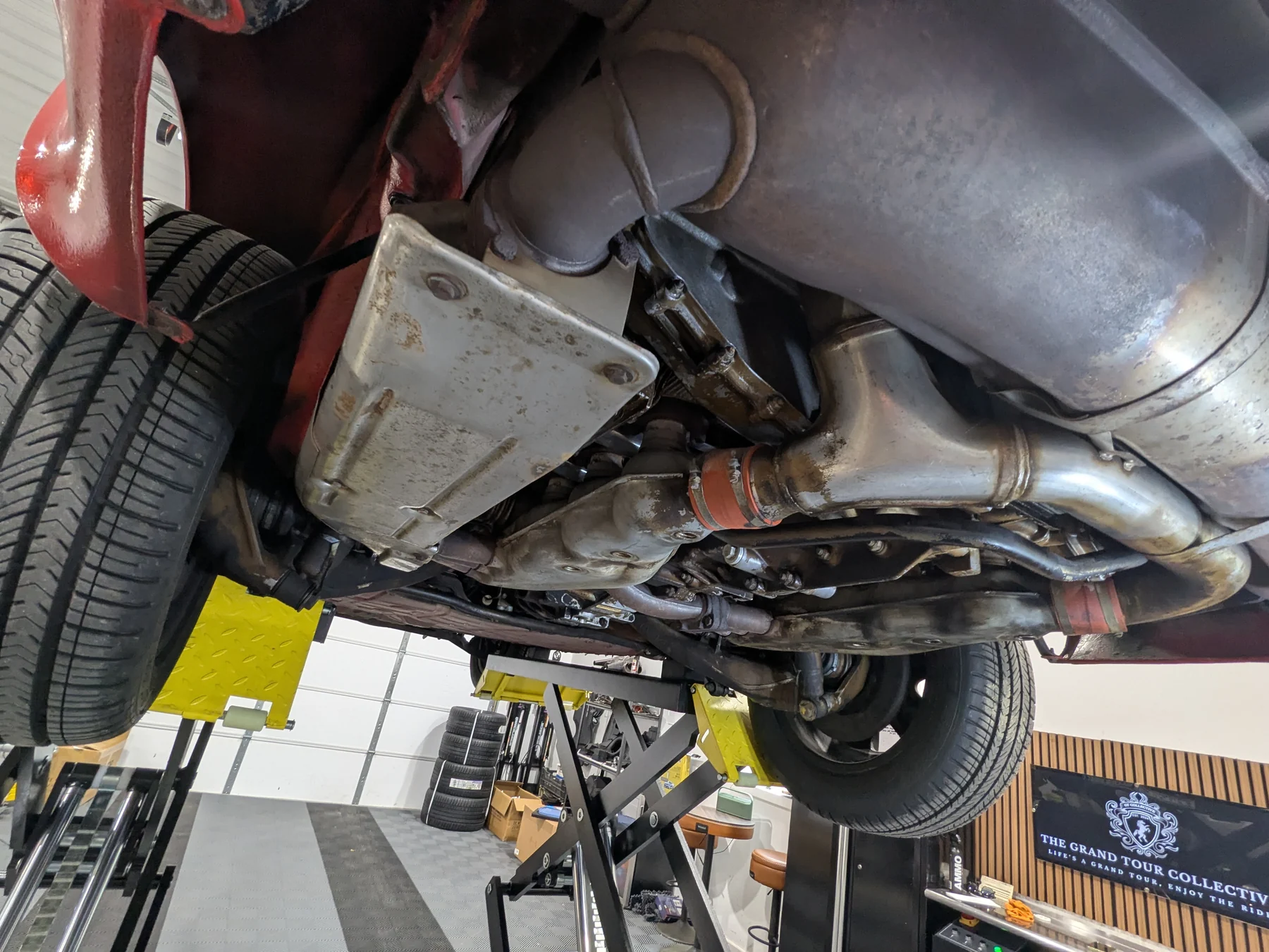 Before dry ice cleaning: exhaust and drivetrain underside detail on the 1988 Porsche 911